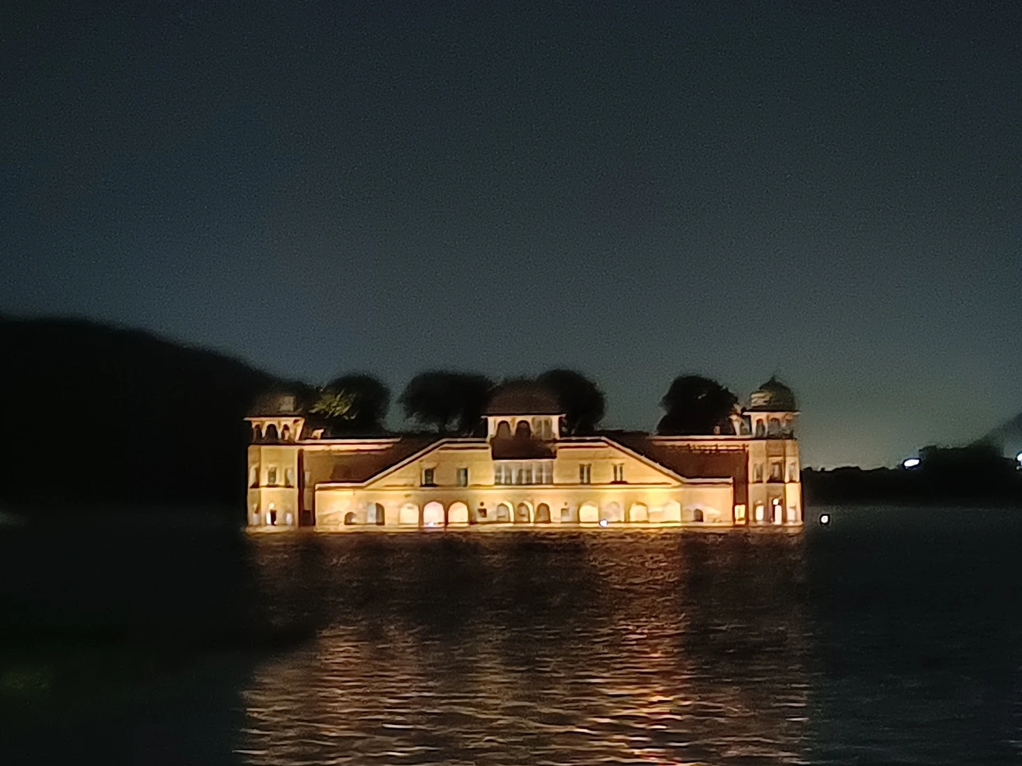 Jal Mahal sightseeing included in Classic Golden Triangle Heritage Tour Package